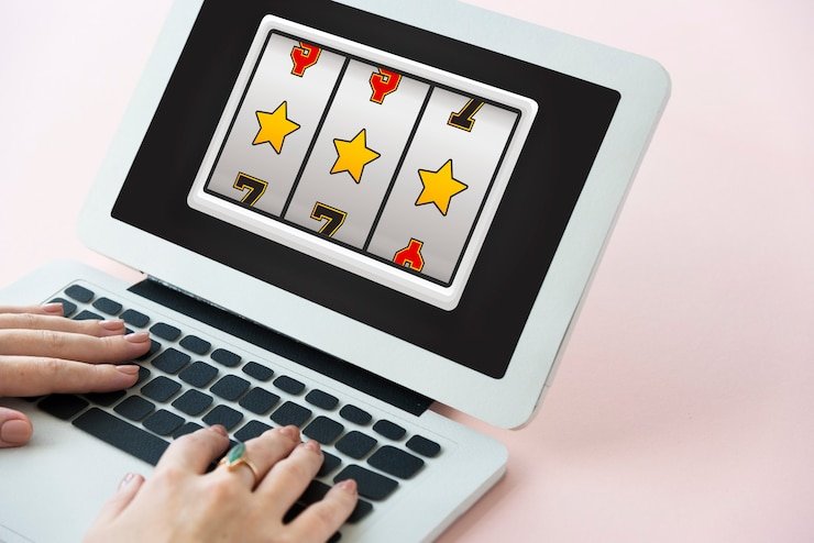 Antarmuka Asia Gaming alfabet slot dengan tampilan meja blackjack dan dealer langsung